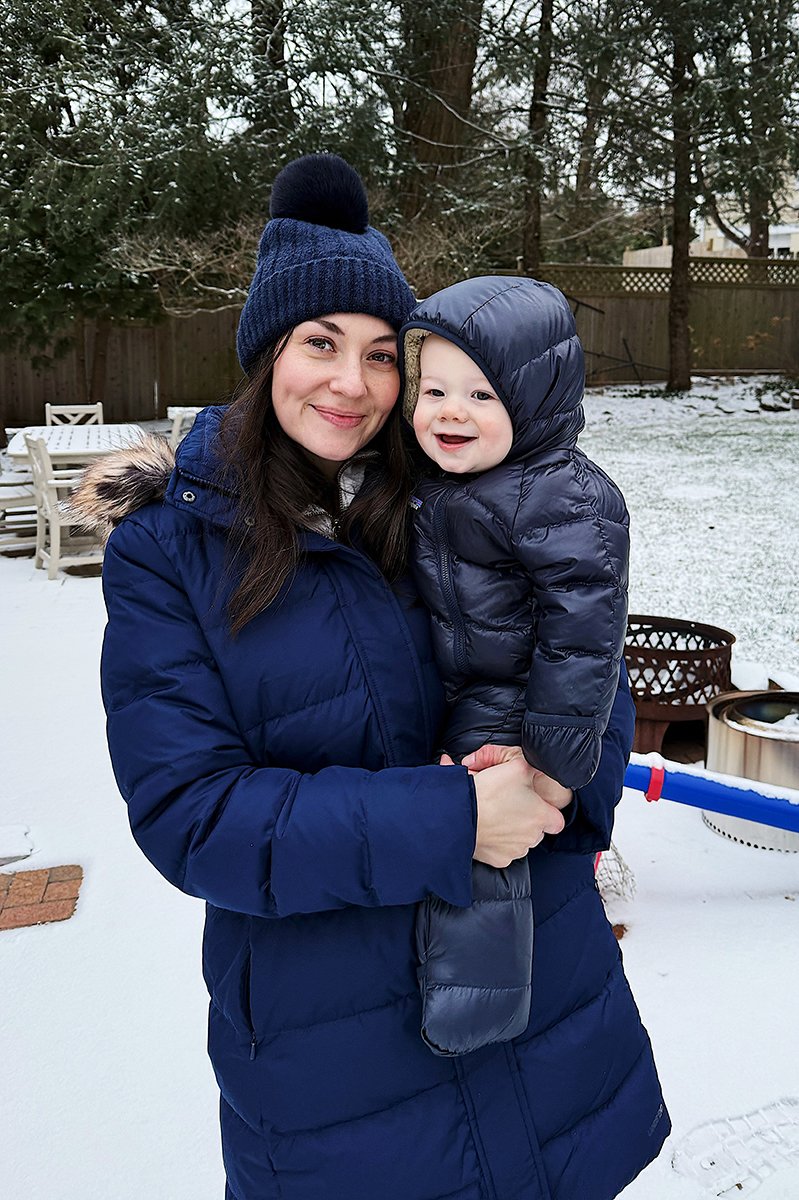Carly holding Rory in the snow!